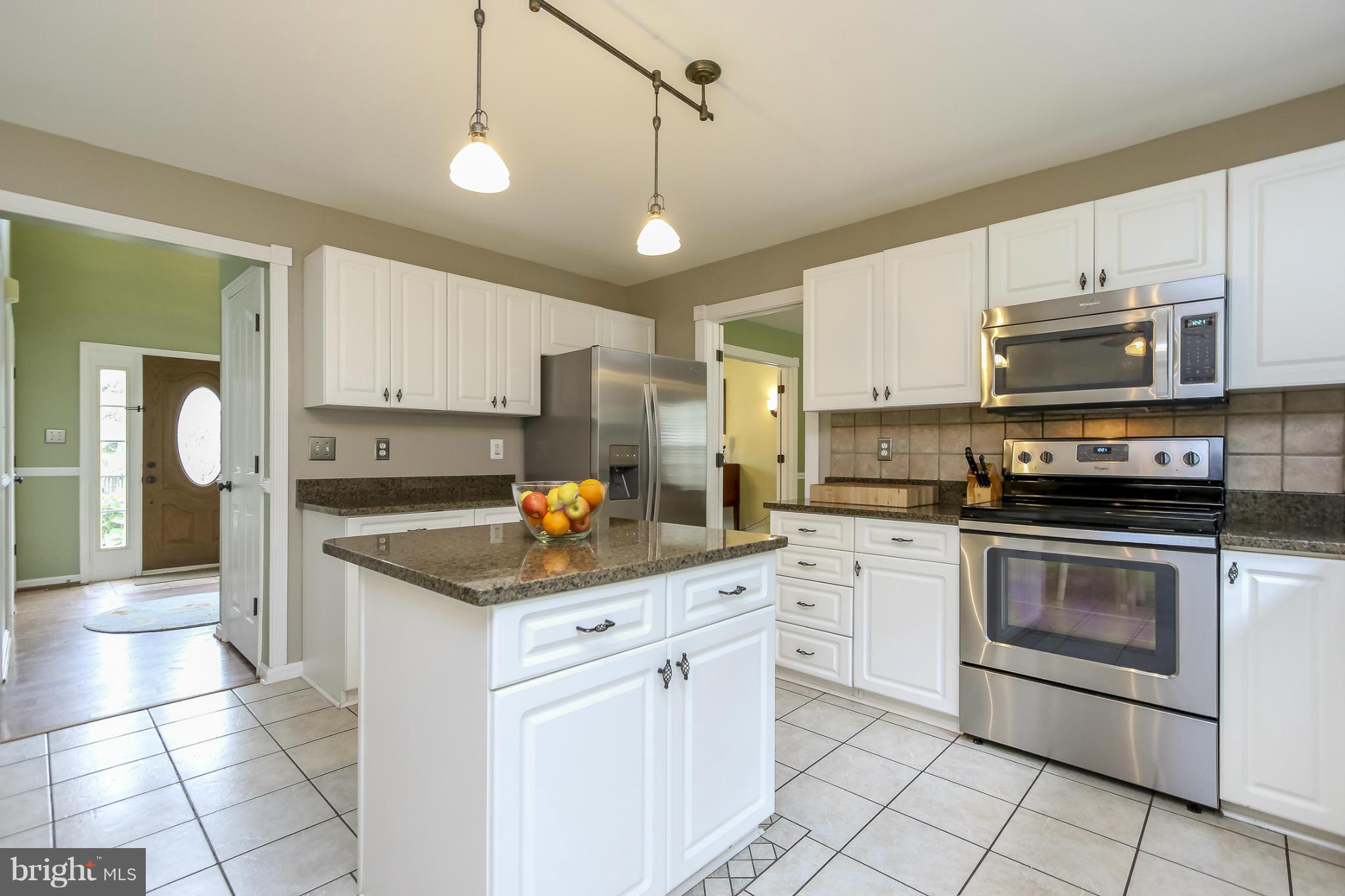 6614 Ridge Road Sykesville, MD 21784 - Photo 8 of 26 Kitchen with bright cabinets