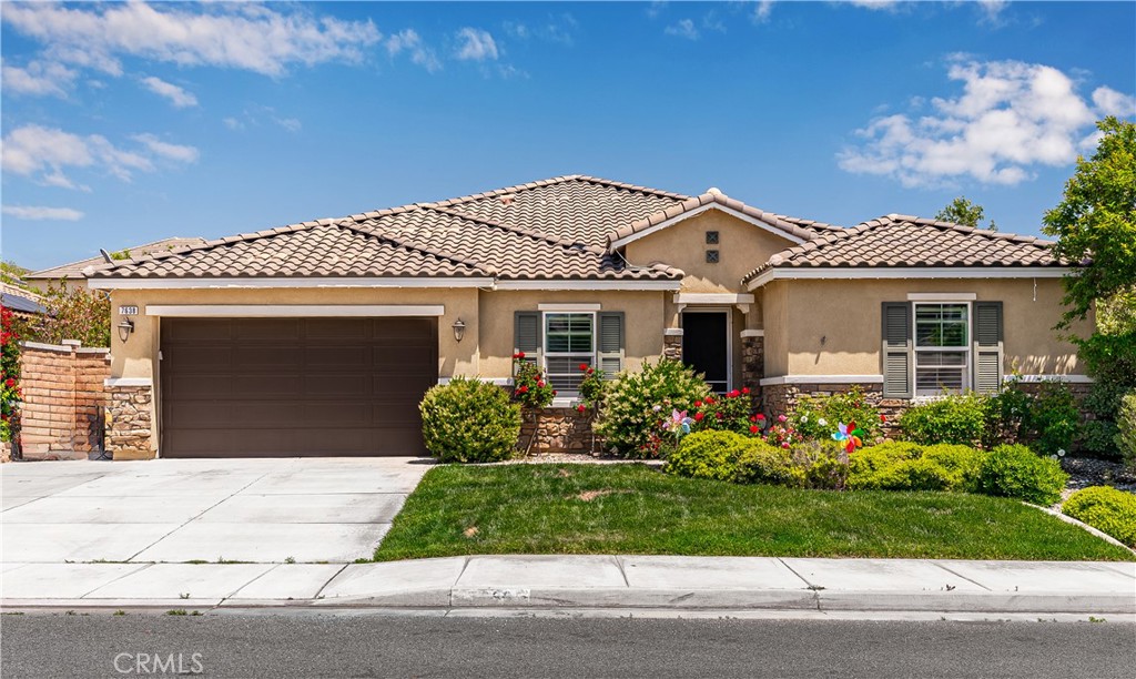 7638 Prairie Drive Riverside, CA 92507 - Photo 1 of 1 front view of a house with a small yard