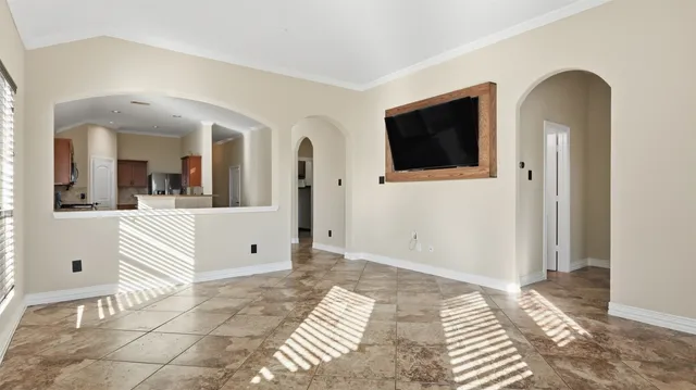 a view of a room with a large window