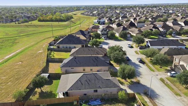 an aerial view of a house with a outdoor space