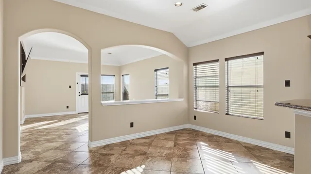 a view of an empty room with window