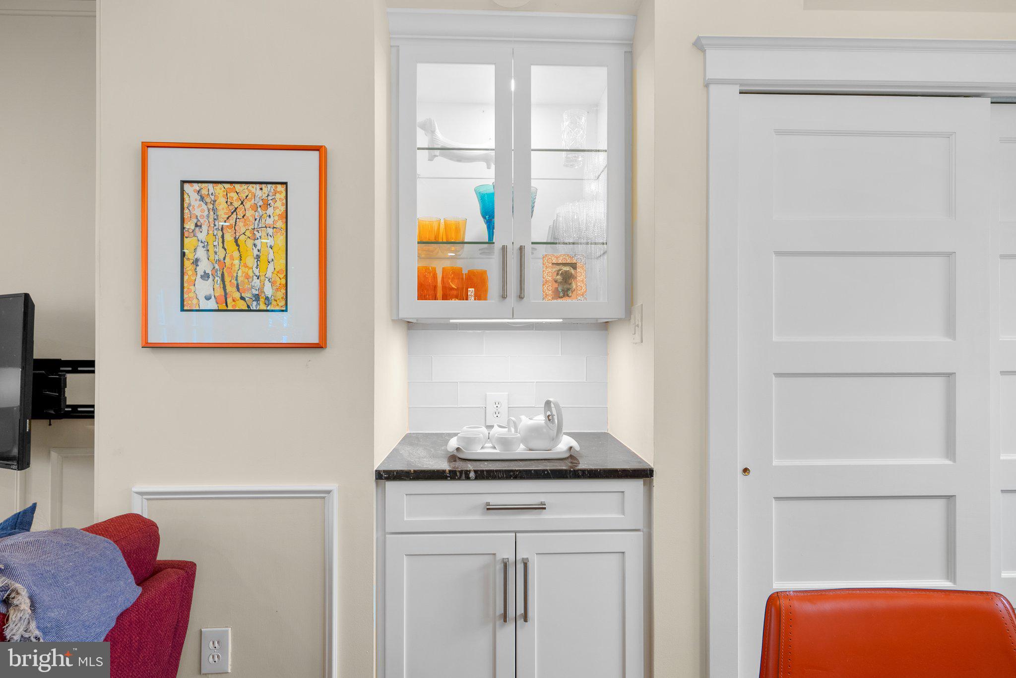 8409 Grove Street Silver Spring, MD 20910 - Photo 34 of 72 Dining Room bar area with cabinet lighting