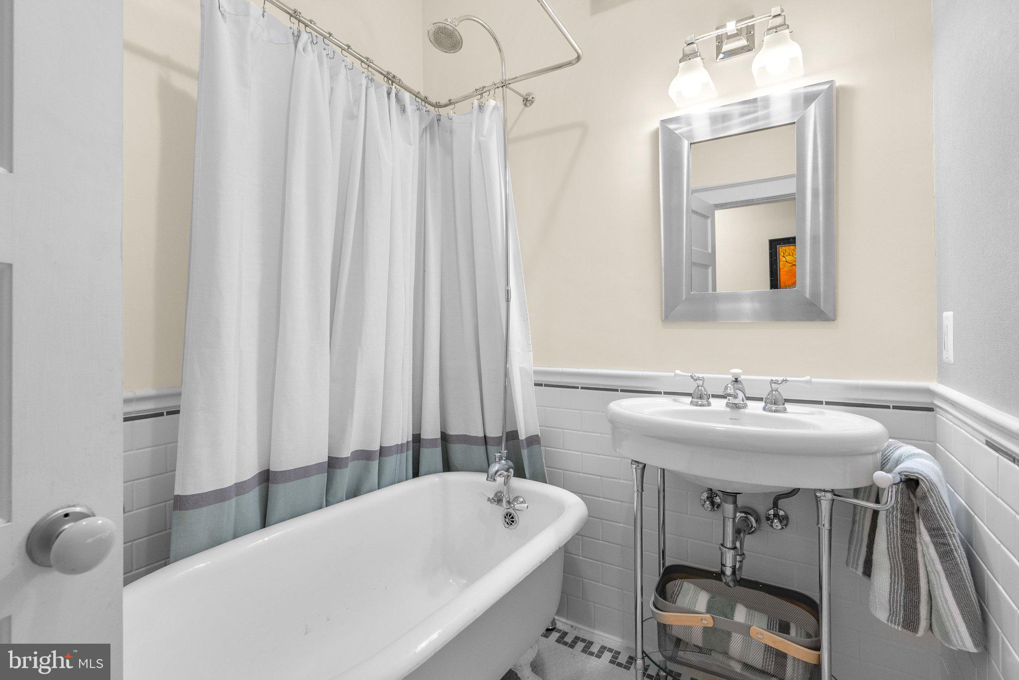 8409 Grove Street Silver Spring, MD 20910 - Photo 37 of 72 Main level full bath with clawfoot tub