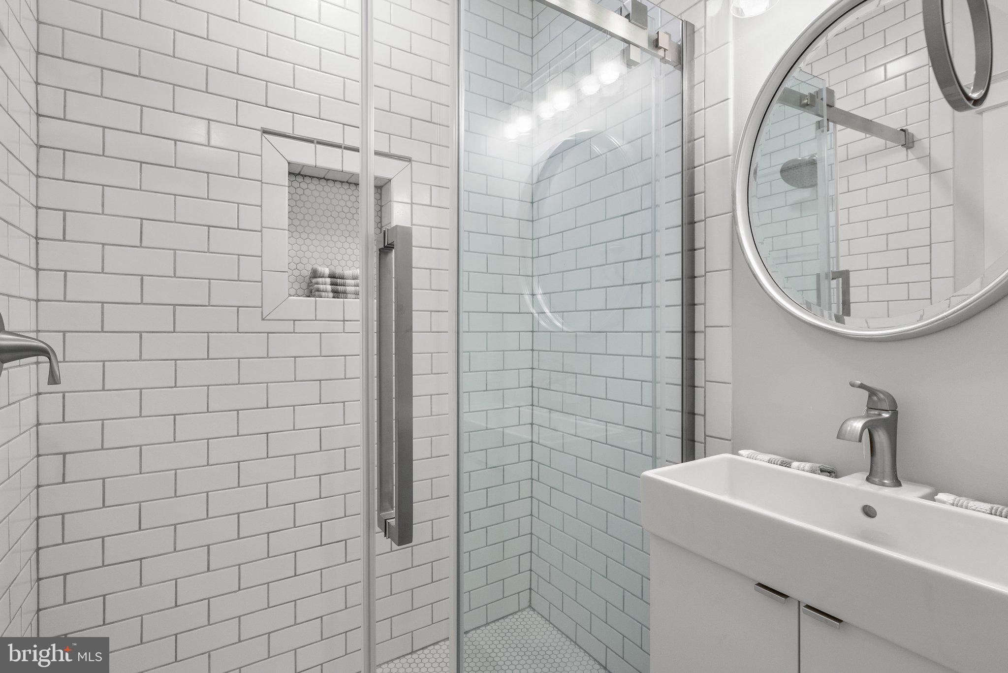 8409 Grove Street Silver Spring, MD 20910 - Photo 52 of 72 Upstairs hall bathroom
