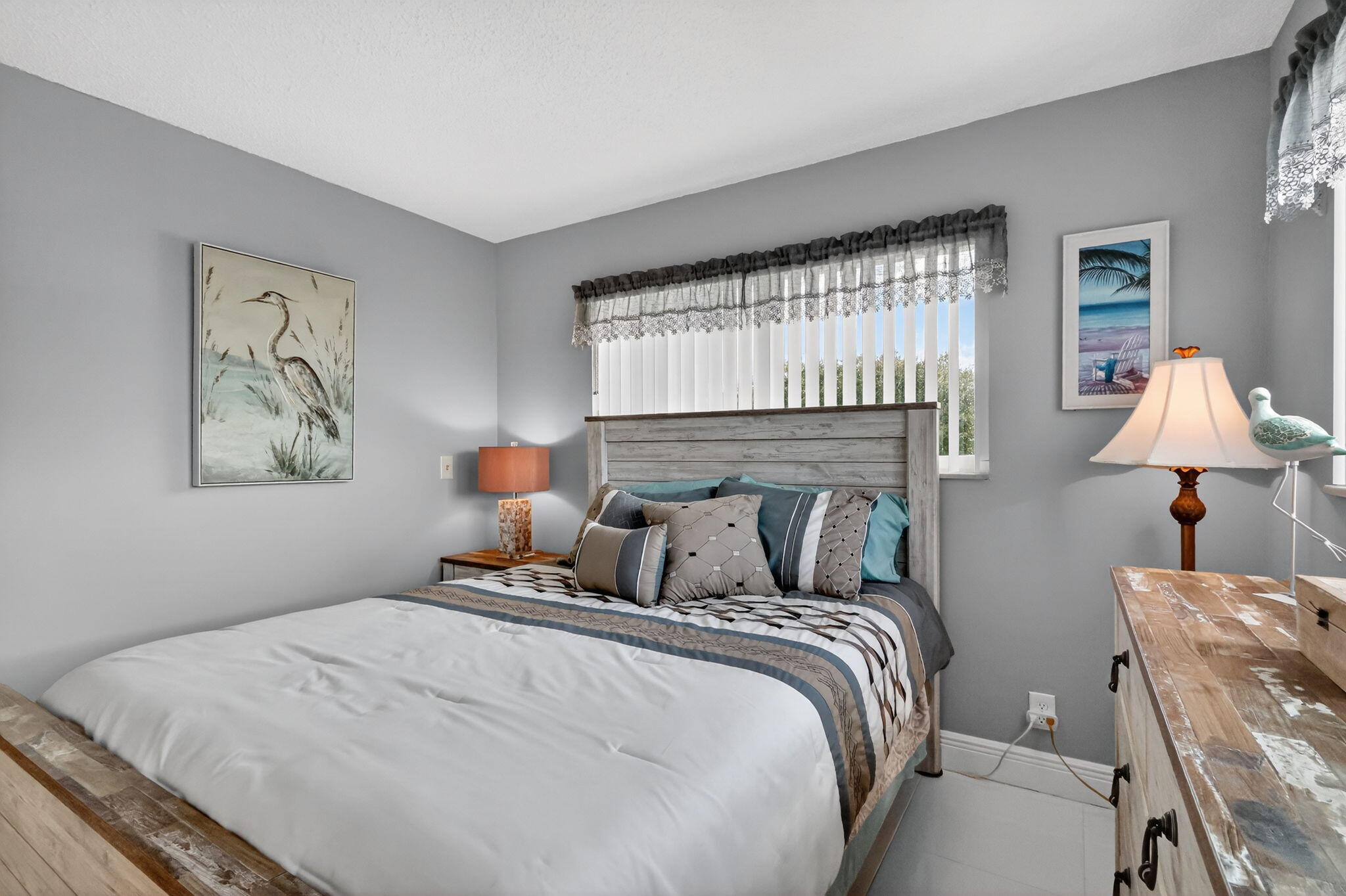 12 Colonial Club Drive, Unit 305 Boynton Beach, FL 33435 - Photo 15 of 51 a bedroom with a bed and window