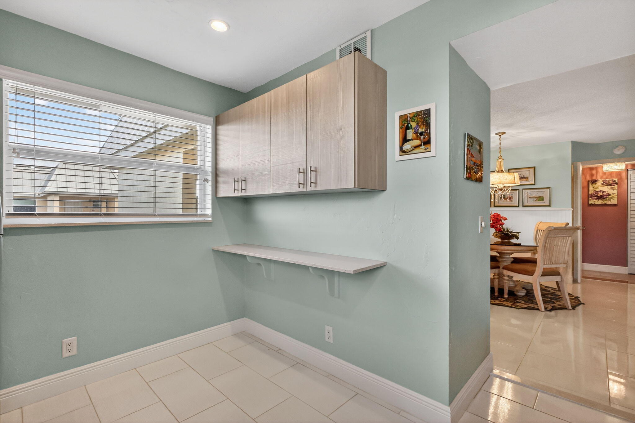 12 Colonial Club Drive, Unit 305 Boynton Beach, FL 33435 - Photo 30 of 51 a view of kitchen and window