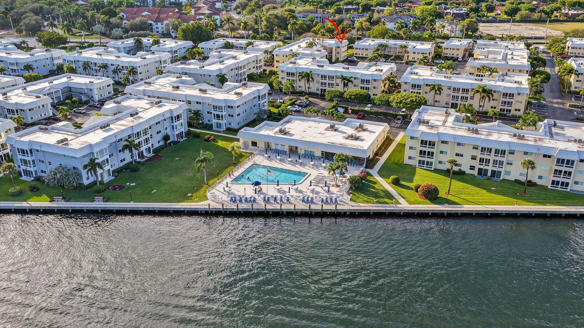 12 Colonial Club Drive, Unit 305 Boynton Beach, FL 33435 - Photo 33 of 51 an aerial view of residential houses with outdoor space