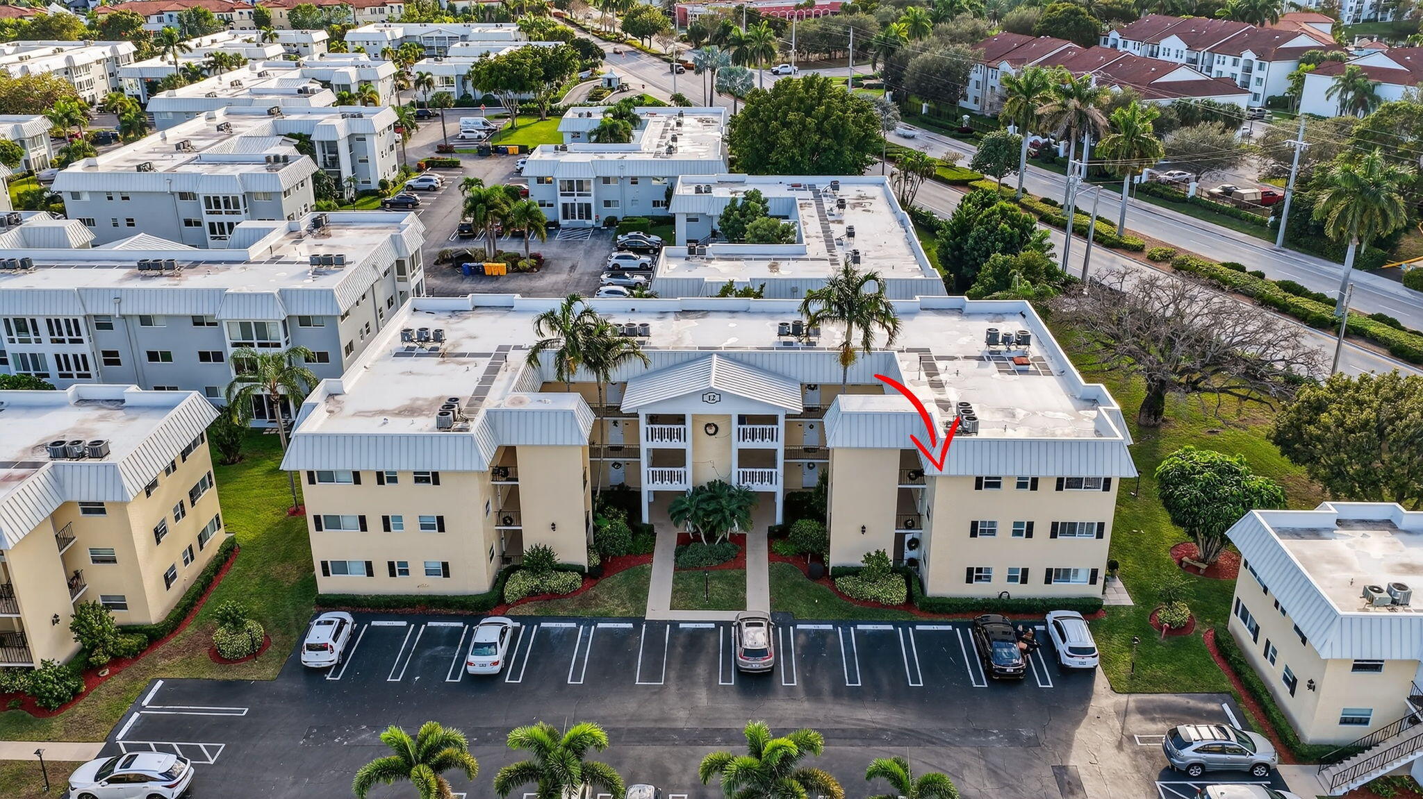 12 Colonial Club Drive, Unit 305 Boynton Beach, FL 33435 - Photo 35 of 51 an aerial view of multiple house