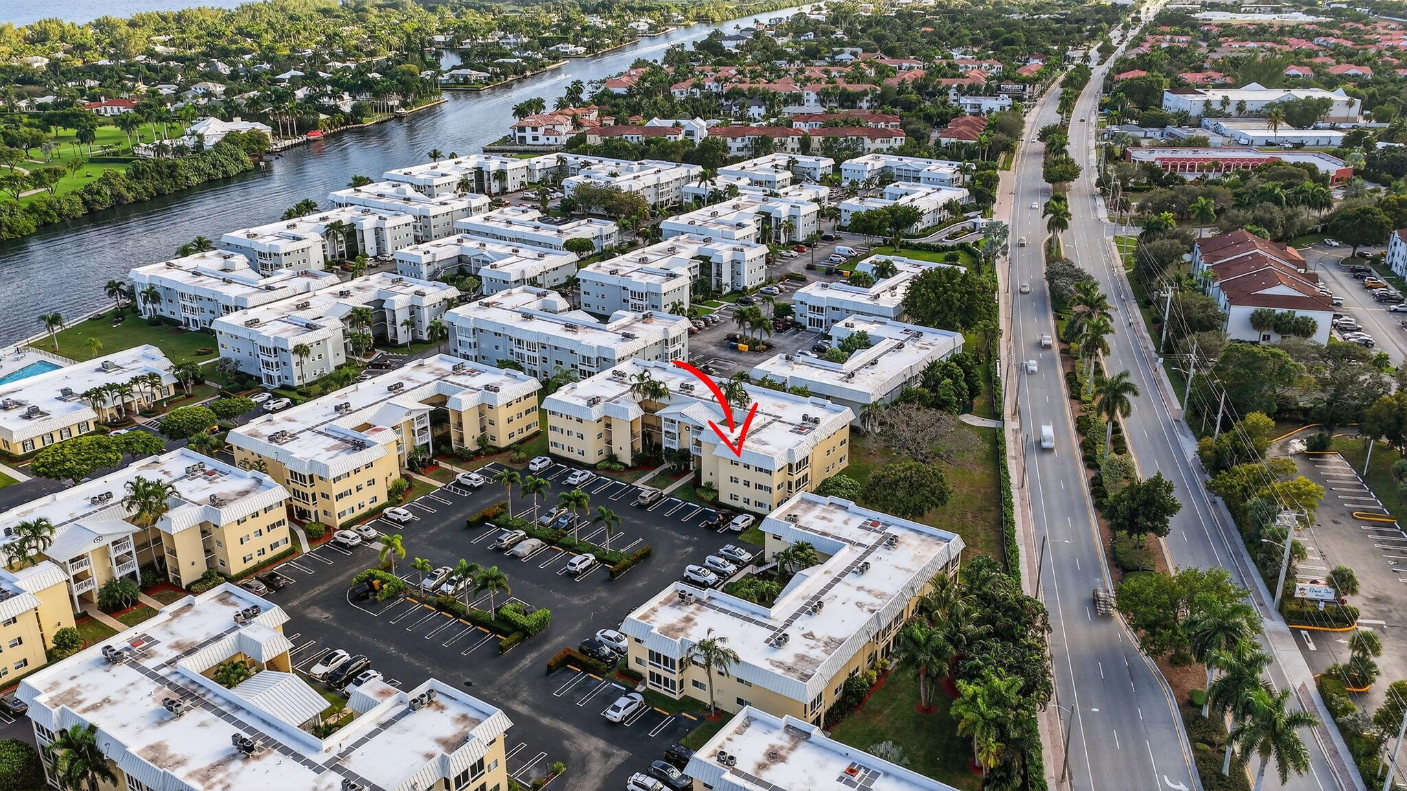 12 Colonial Club Drive, Unit 305 Boynton Beach, FL 33435 - Photo 39 of 51 an aerial view of a city with lots of residential buildings