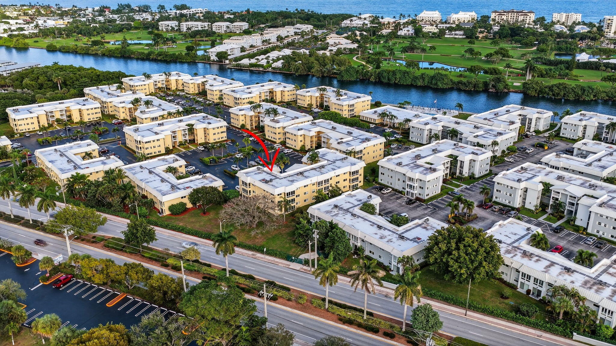 12 Colonial Club Drive, Unit 305 Boynton Beach, FL 33435 - Photo 43 of 51 an aerial view of a city with lake view