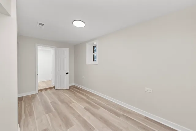 a view of a house with a small yard