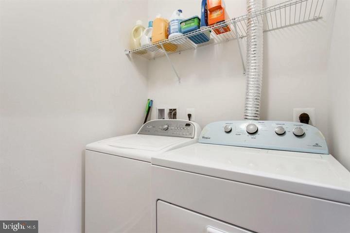 41663 McMonagle Square Aldie, VA 20105 - Photo 12 of 22 a utility room with dryer and washer