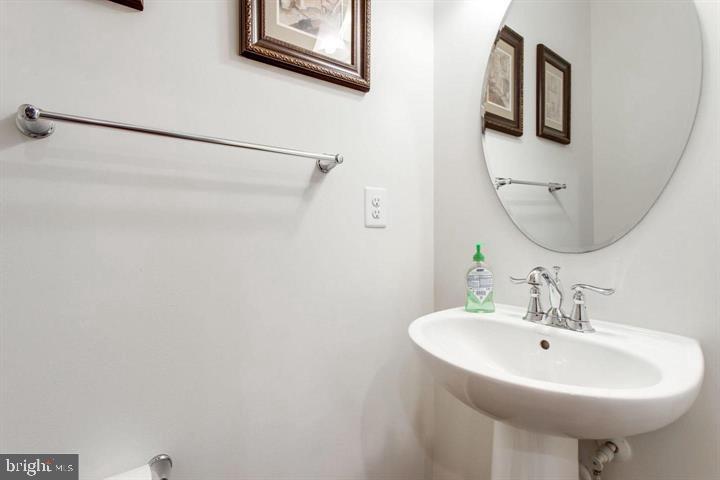 41663 McMonagle Square Aldie, VA 20105 - Photo 13 of 22 a white sink sitting next to a white sink