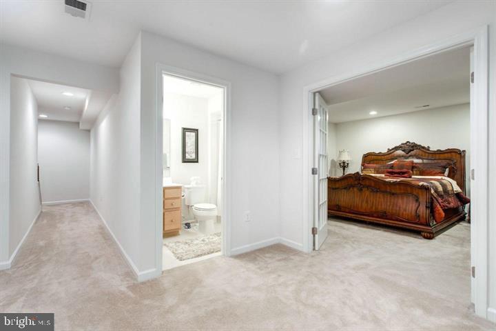 41663 McMonagle Square Aldie, VA 20105 - Photo 20 of 22 a living room with furniture and a walk in closet