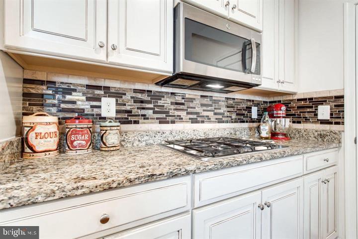 41663 McMonagle Square Aldie, VA 20105 - Photo 4 of 22 a kitchen with a sink and cabinets