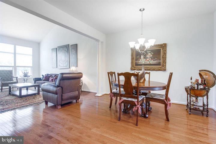 41663 McMonagle Square Aldie, VA 20105 - Photo 7 of 22 a living room with furniture and a wooden floor