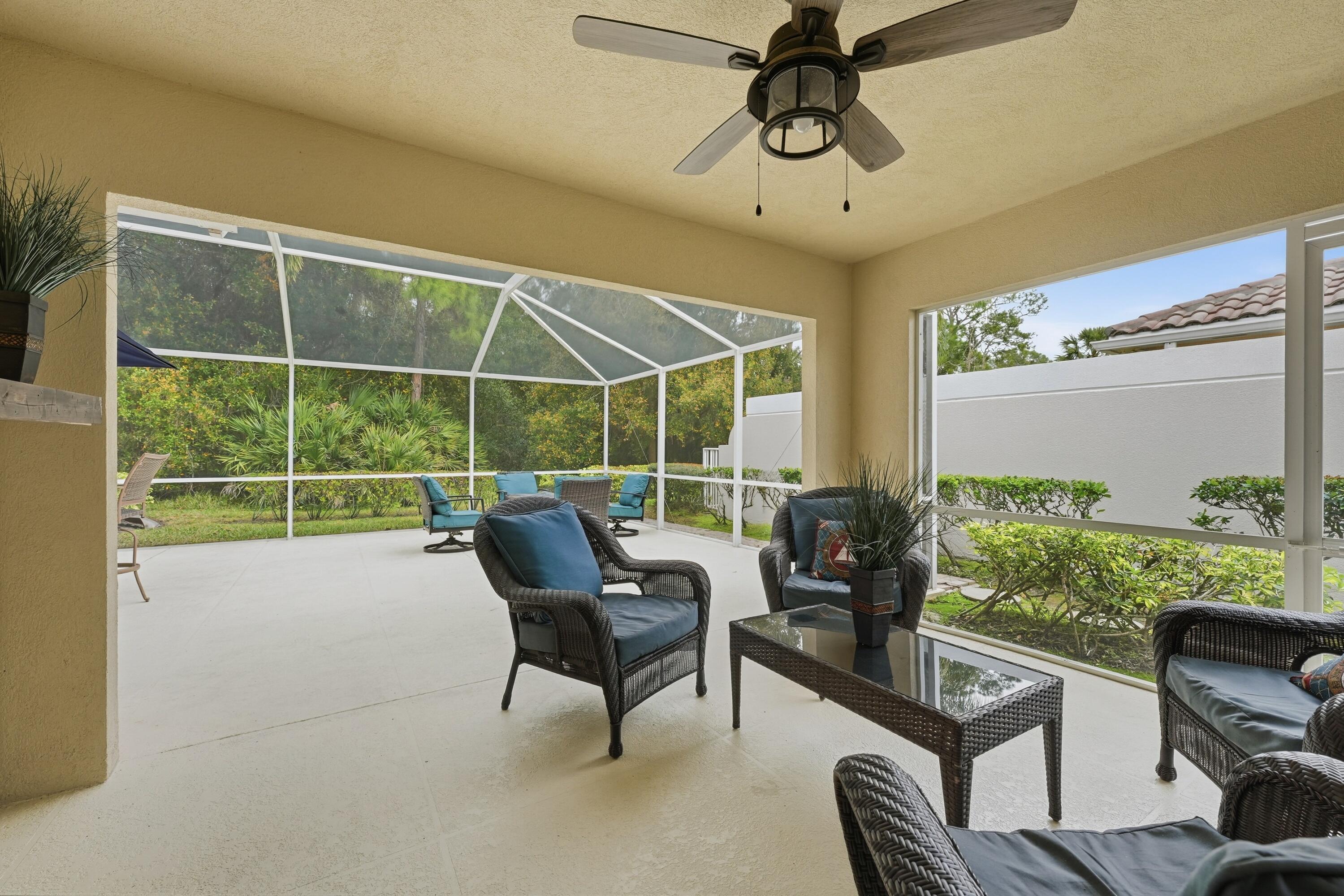 1019 Southwest Tamarrow Place Stuart, FL 34997 - Photo 18 of 34 Covered porch and screen enclosure