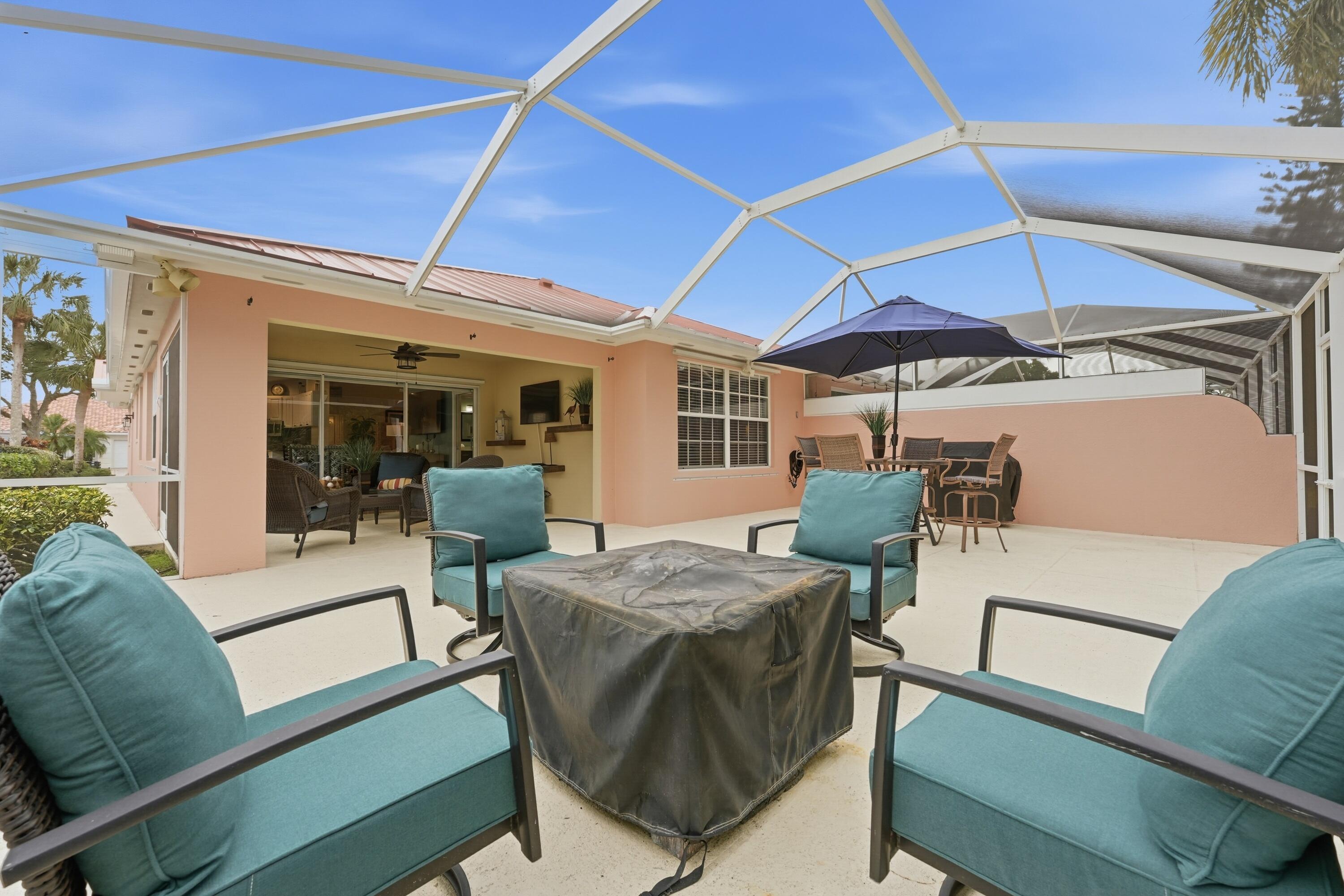 1019 Southwest Tamarrow Place Stuart, FL 34997 - Photo 19 of 34 Large screened patio and covered porch
