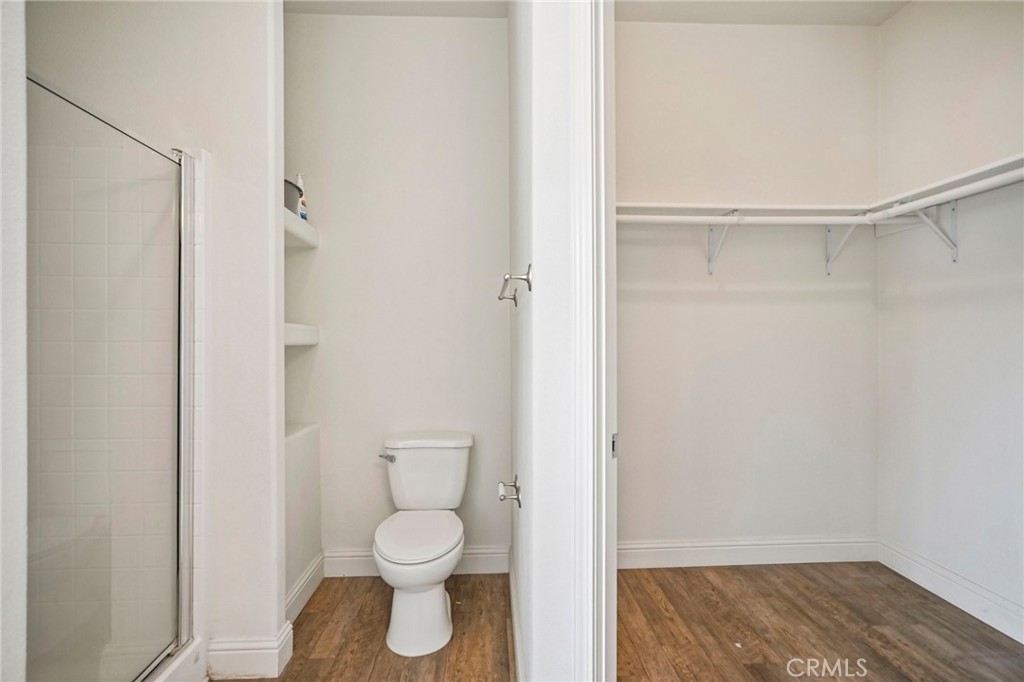 250 East Telegraph Road, Unit 307 Fillmore, CA 93015 - Photo 28 of 36 a bathroom with a toilet and a shower