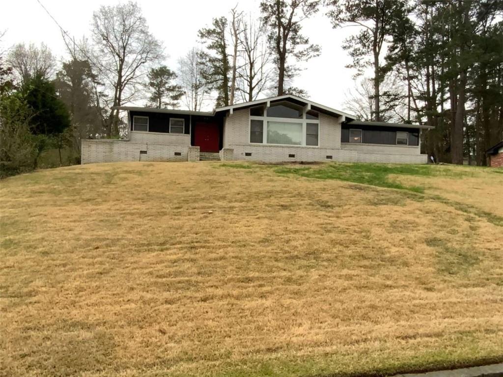 3537 Springside Drive Decatur, GA 30032 - Photo 1 of 1 a front view of a house with a yard