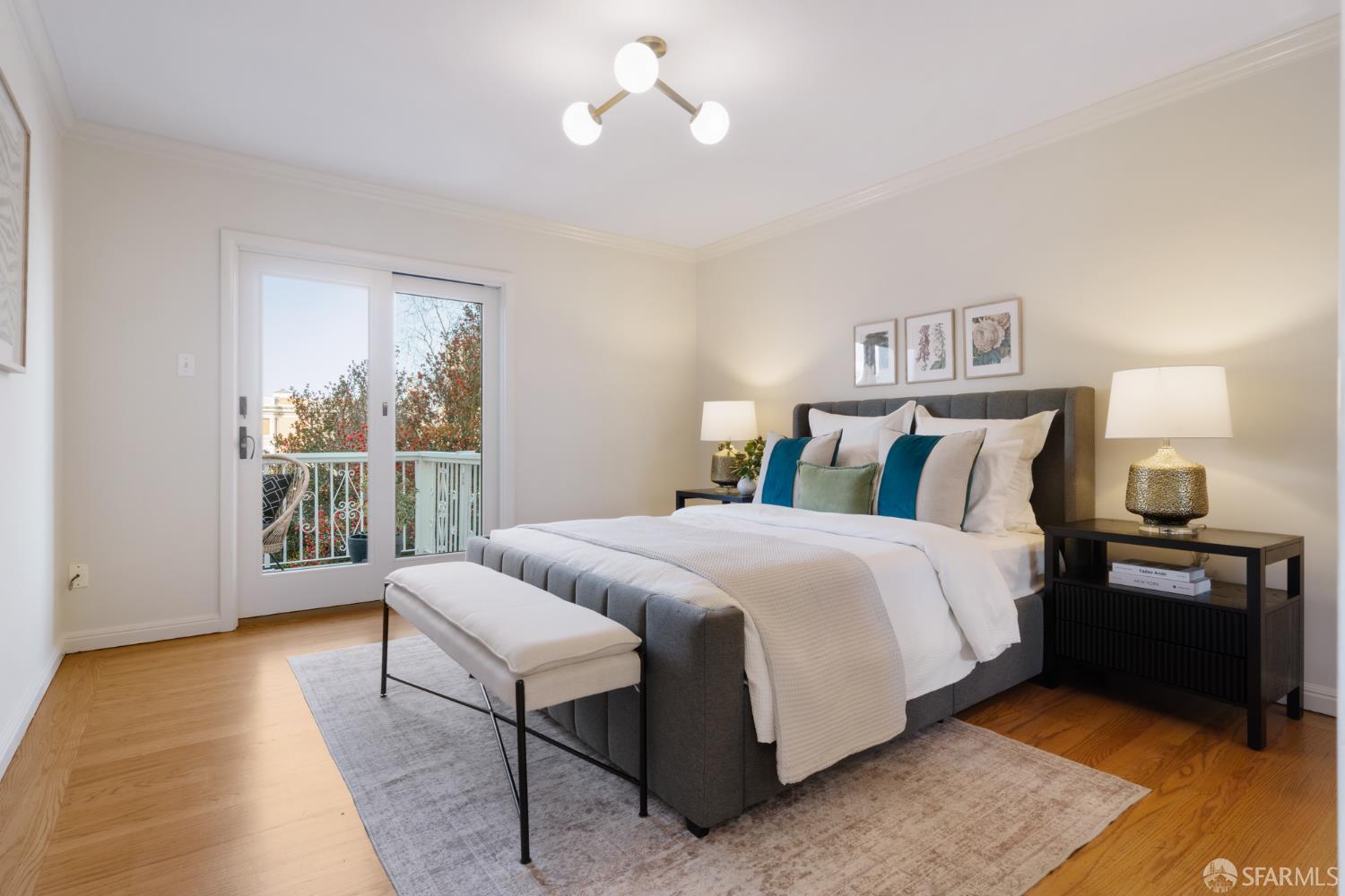 1768 Jackson Street San Francisco, CA 94109 - Photo 20 of 33 a bedroom with a bed and wooden floor