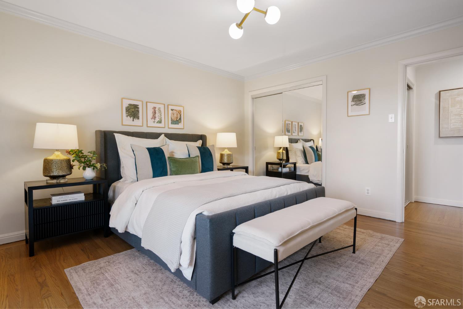 1768 Jackson Street San Francisco, CA 94109 - Photo 21 of 33 a bedroom with a bed and wooden floor