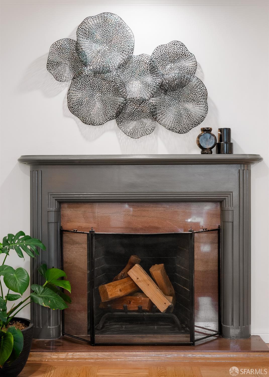 1768 Jackson Street San Francisco, CA 94109 - Photo 6 of 33 a living room with furniture and a fireplace