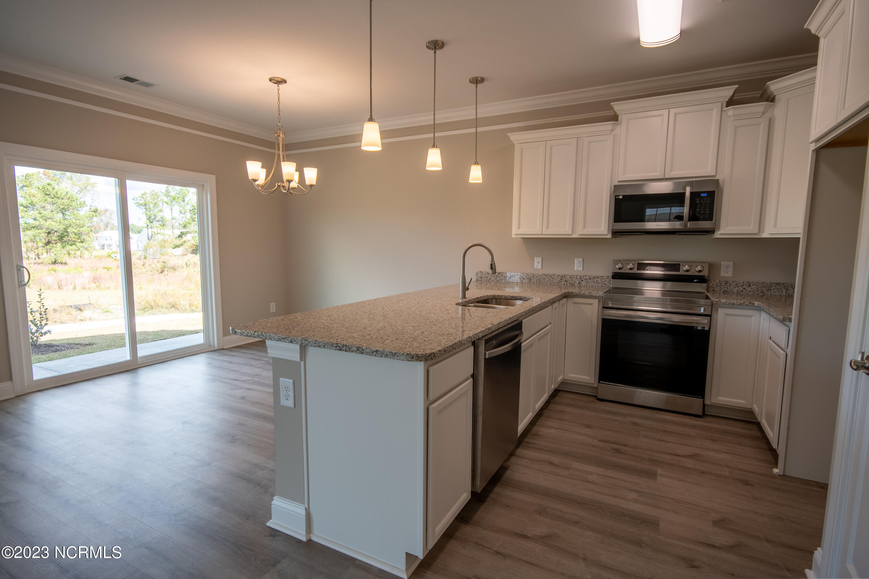 7603 Privateer Loop Sunset Beach, NC 28468 - Photo 15 of 25 Pictures, photographs, colors, features, and sizes are for illustration purposes only and will vary from the homes as built.