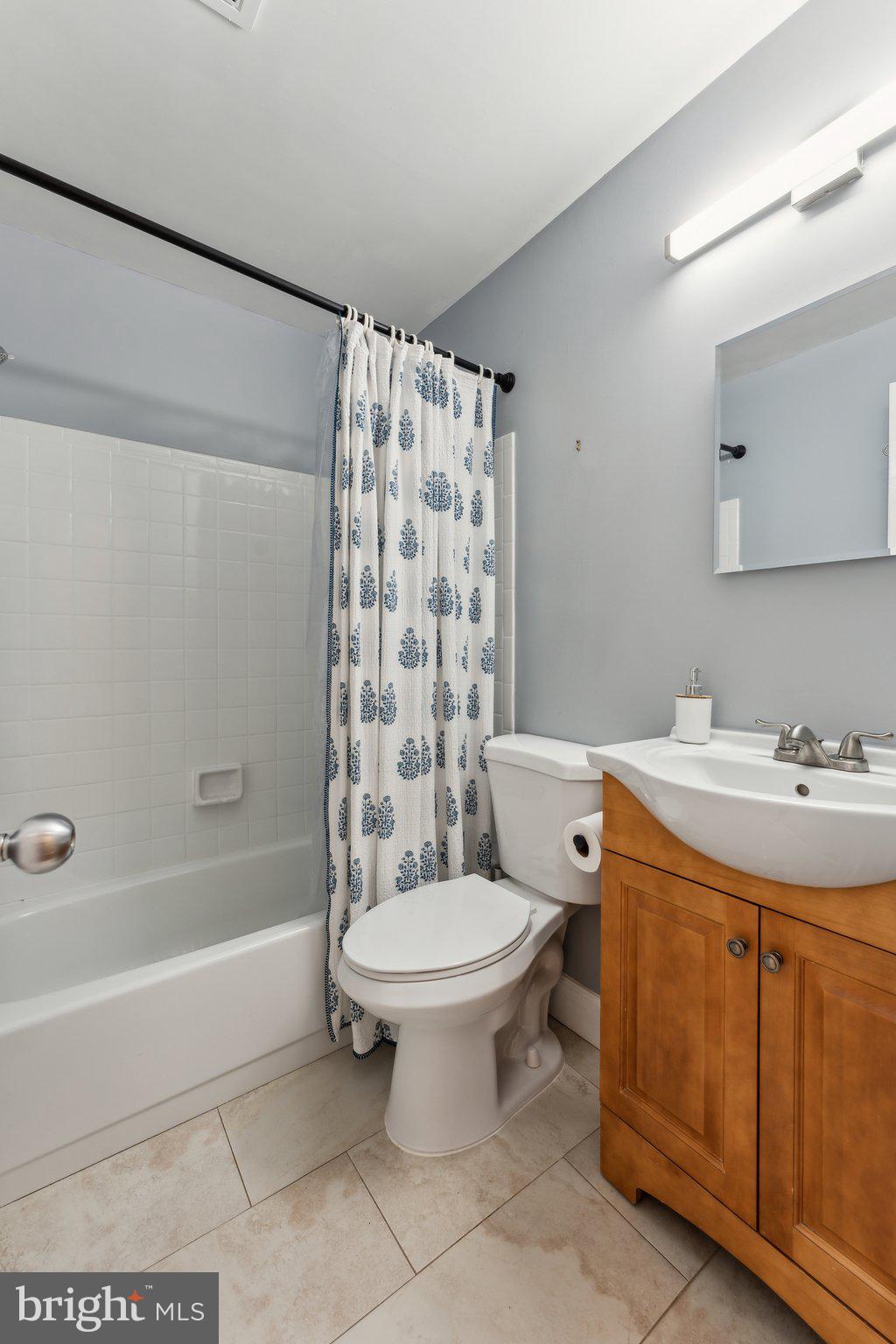 1844 Columbia Road Northwest, Unit 103 Washington, DC 20009 - Photo 8 of 21 a bathroom with a sink toilet and shower