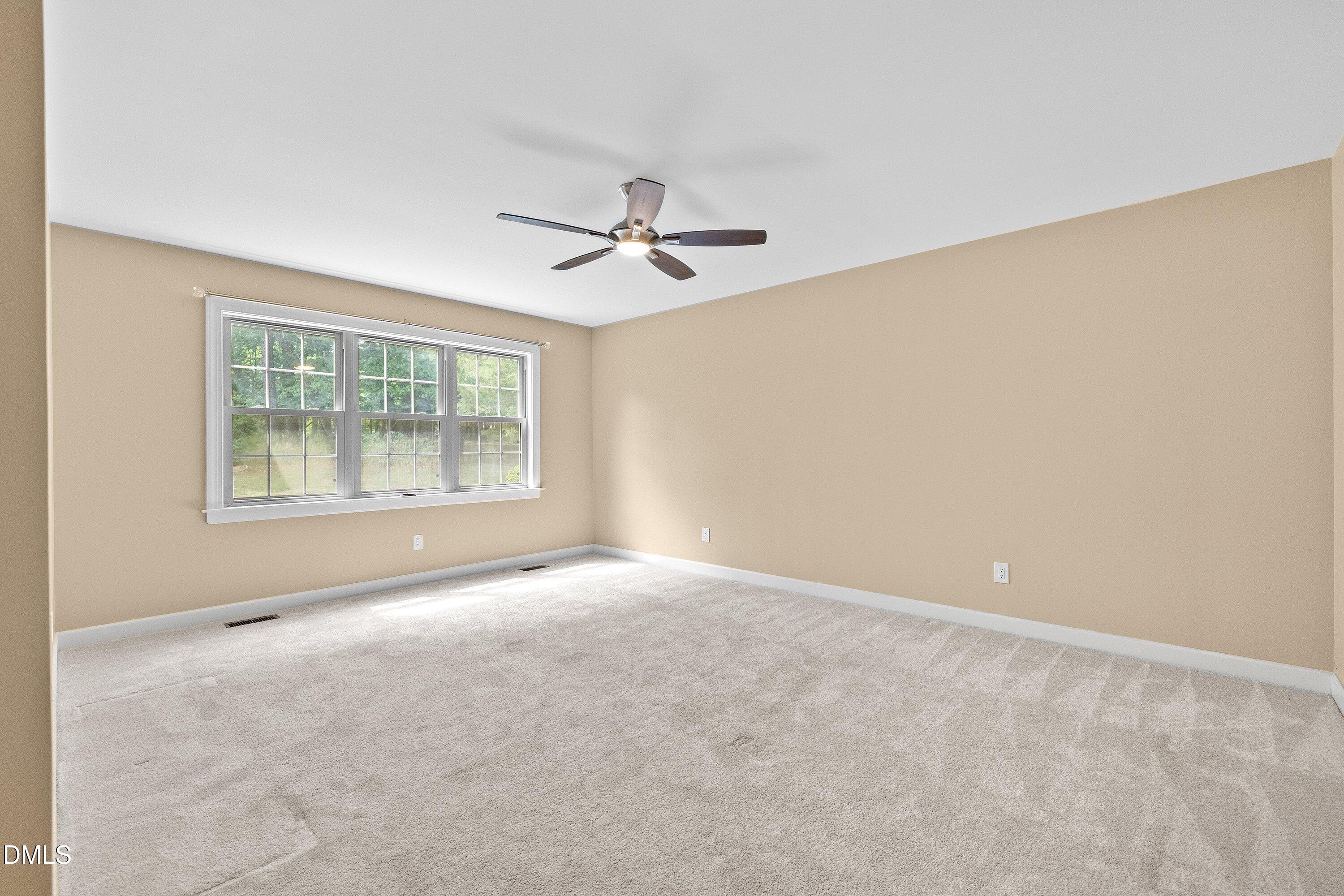8133 Holly Forest Road Wake Forest, NC 27587 - Photo 23 of 50 a view of an empty room with a window