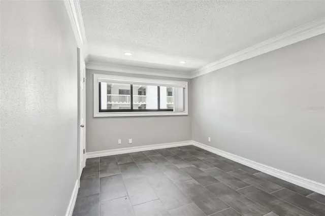 a bathroom with a granite countertop toilet sink and a mirror