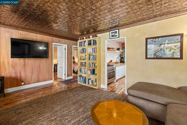 a kitchen with a stove and a table