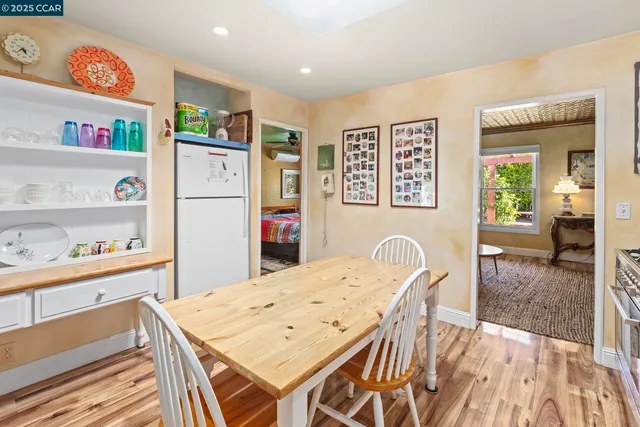a view of a livingroom with furniture and chandelier