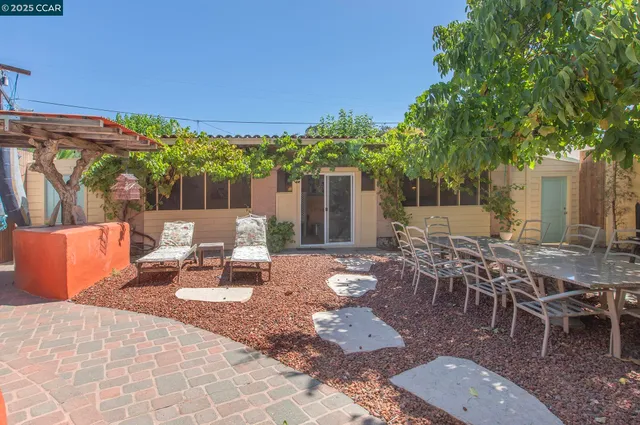 swimming pool view with a backyard space