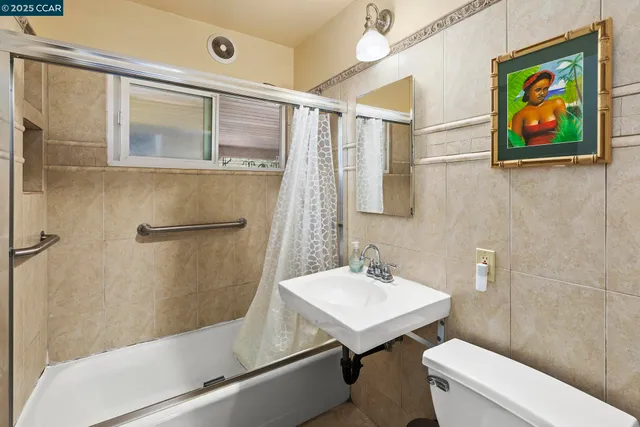 a view of a backyard with sitting area