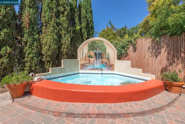 an aerial view of a house with a garden