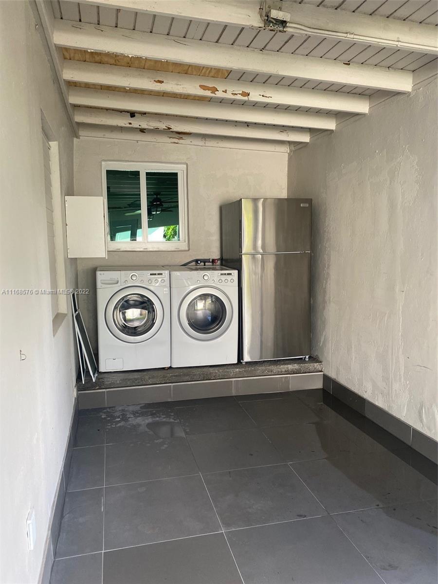 6561 Southwest 30th Street, Unit FRONT Miami, FL 33155 - Photo 18 of 18 a utility room with dryer and washer