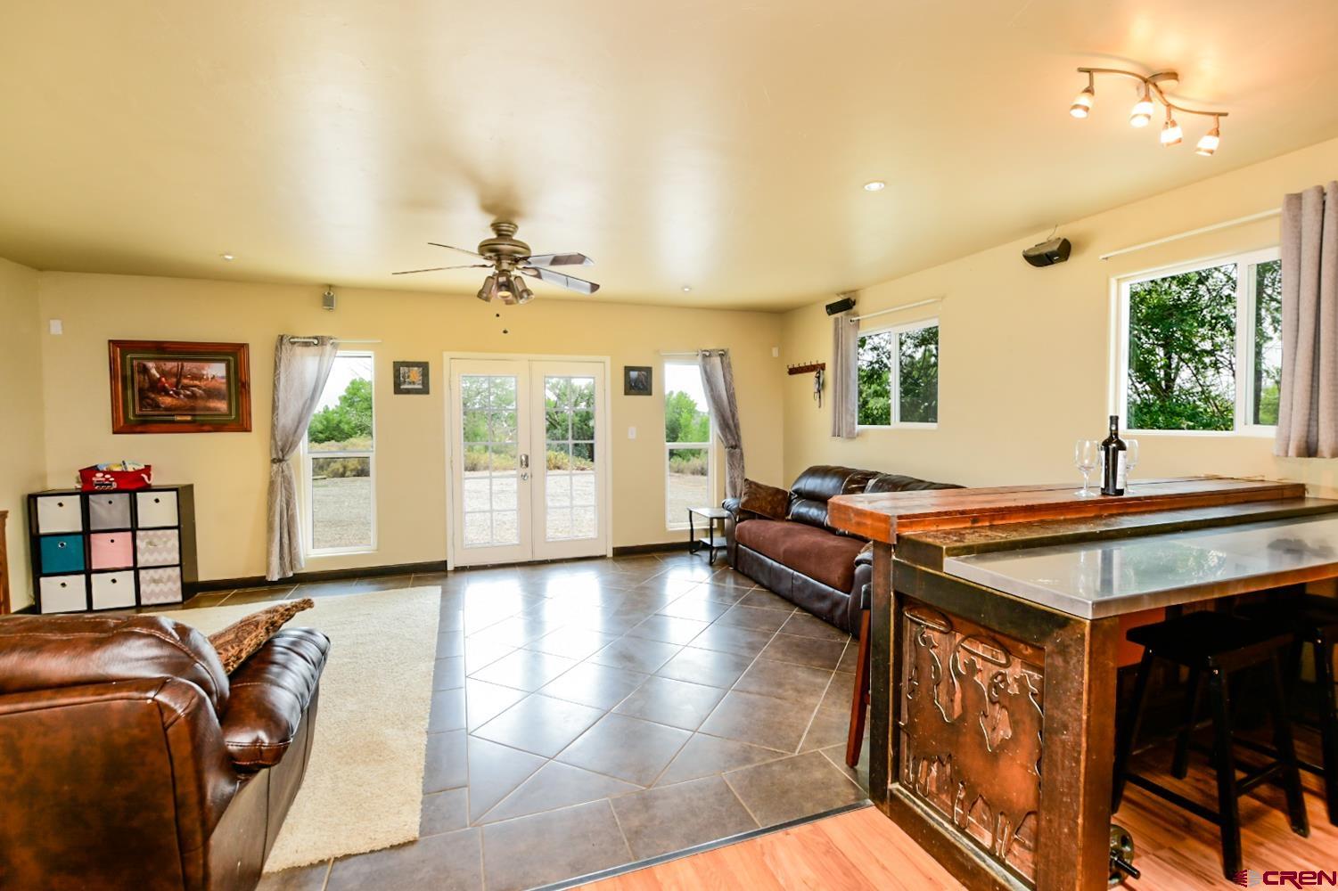 22247 H75 Road Delta, CO 81416 - Photo 11 of 35 a room with furniture pool table and windows