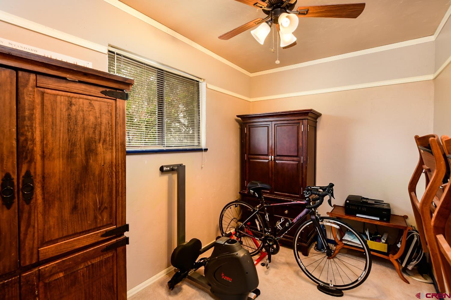22247 H75 Road Delta, CO 81416 - Photo 18 of 35 a view of a room with gym equipment