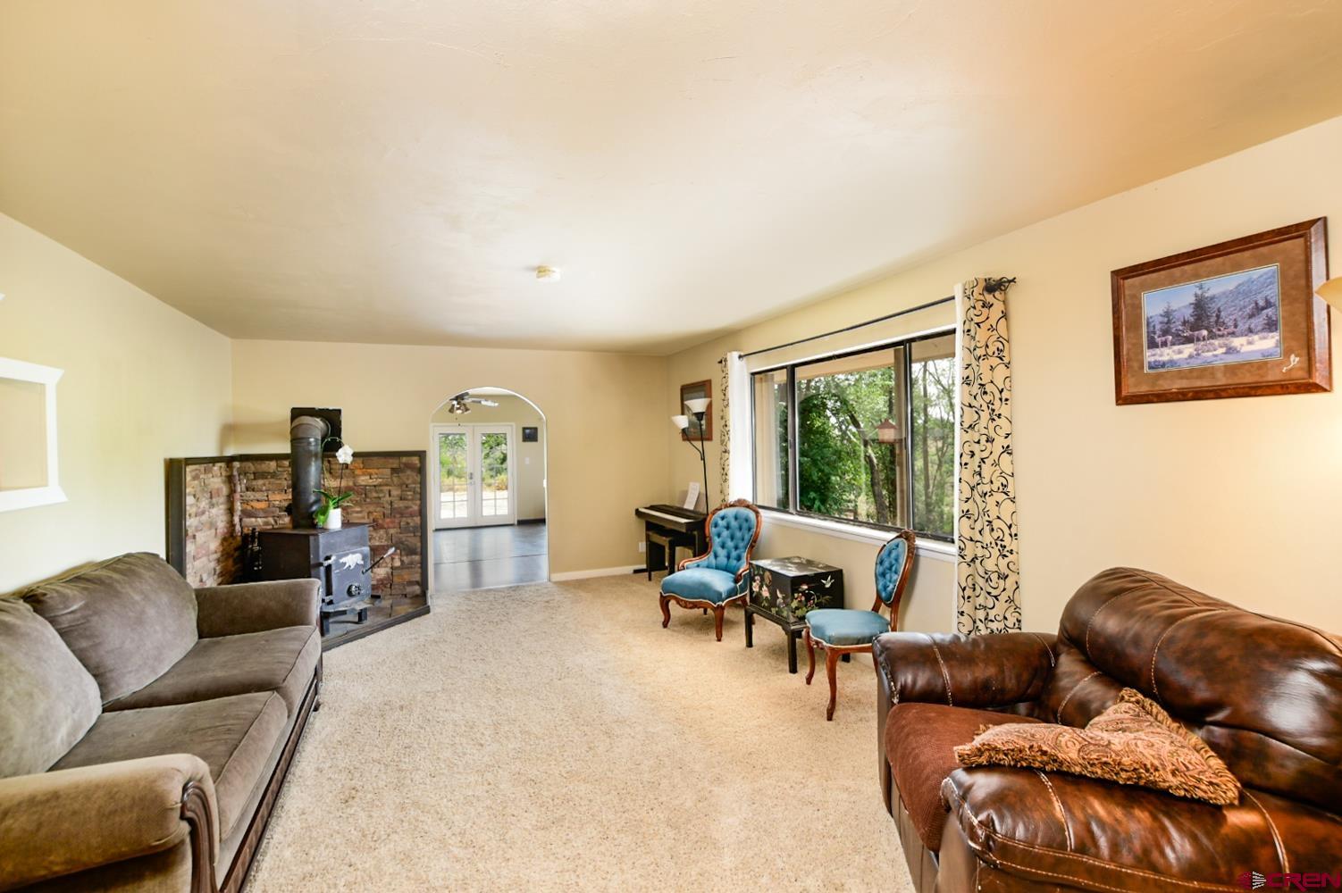 22247 H75 Road Delta, CO 81416 - Photo 21 of 35 a living room with furniture and a window