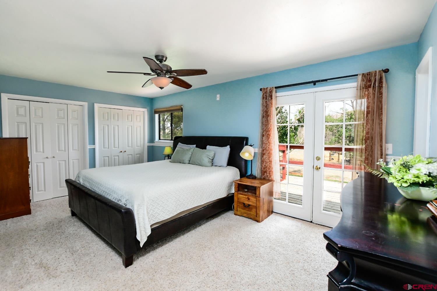 22247 H75 Road Delta, CO 81416 - Photo 26 of 35 a bedroom with a bed and a potted plant