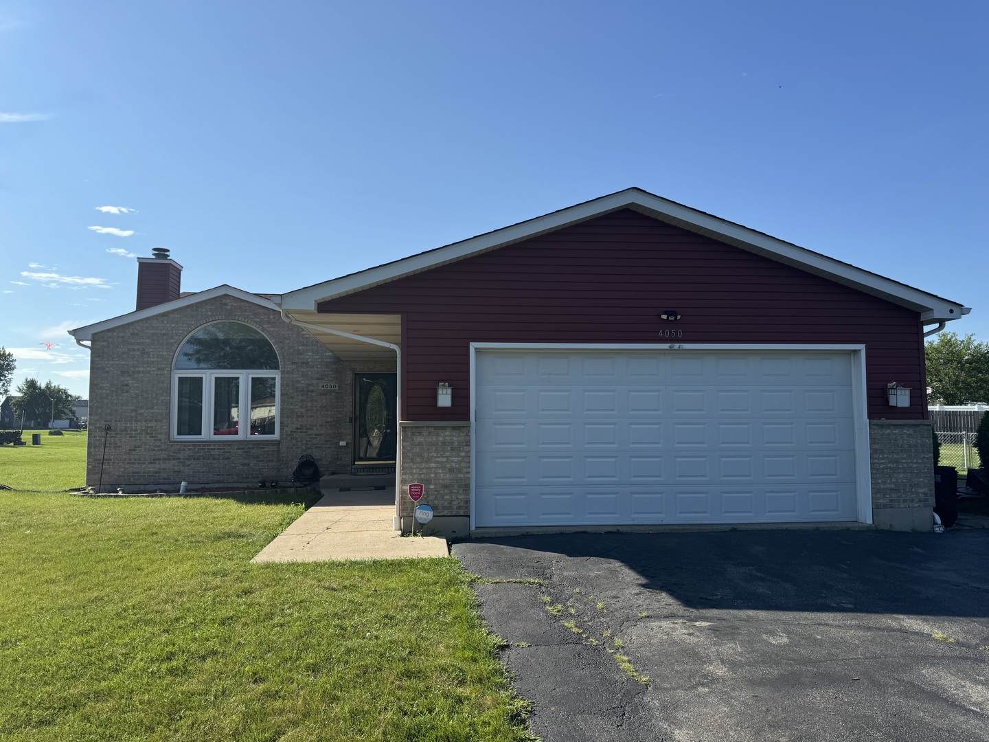 4050 Ridge Road Zion, IL 60099 - Photo 1 of 10 a front view of a house with yard