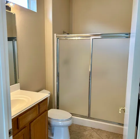 a bathroom with a sink and toilet