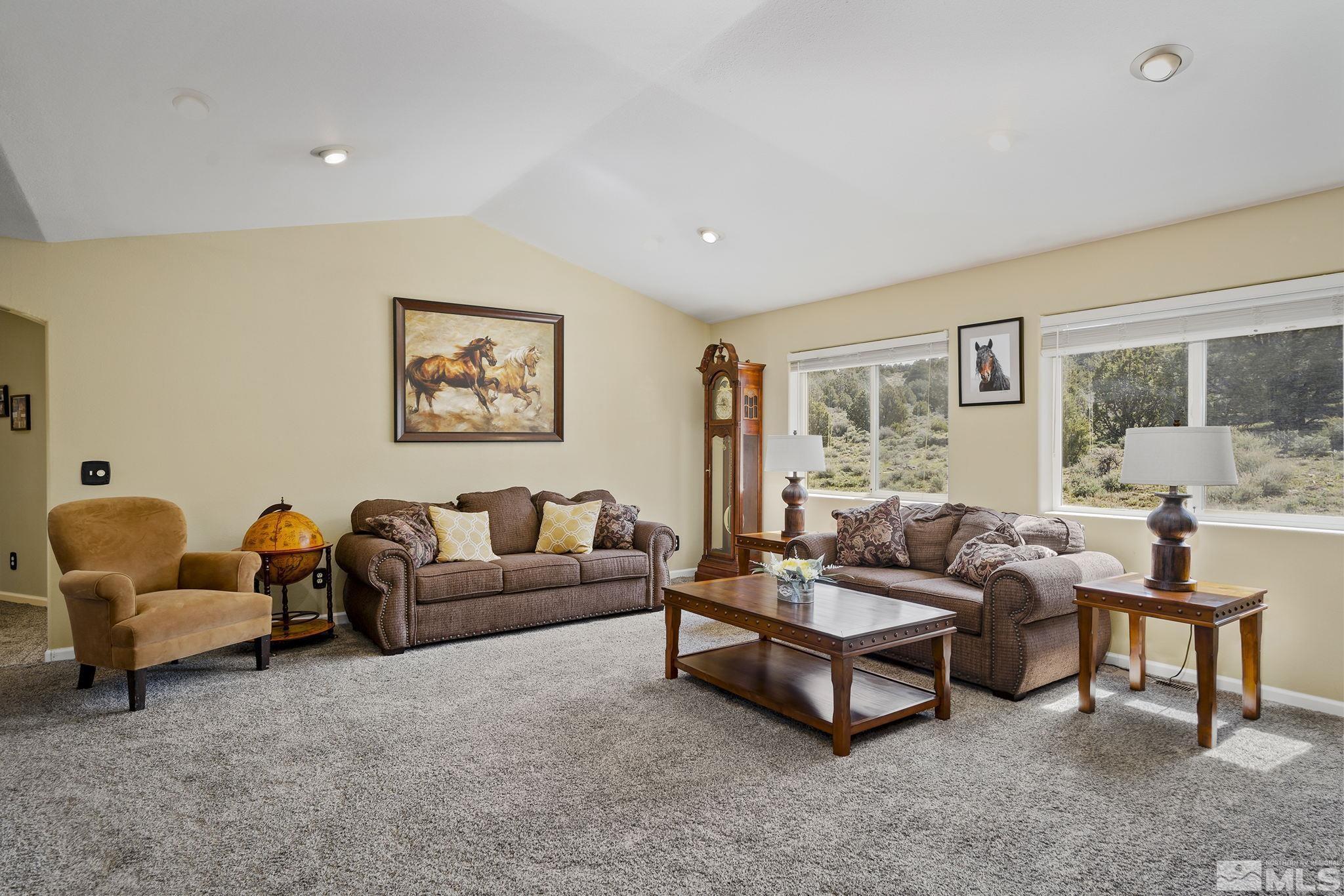 2291 Lousetown Road Reno, NV 89521 - Photo 7 of 40 a living room with furniture and a window
