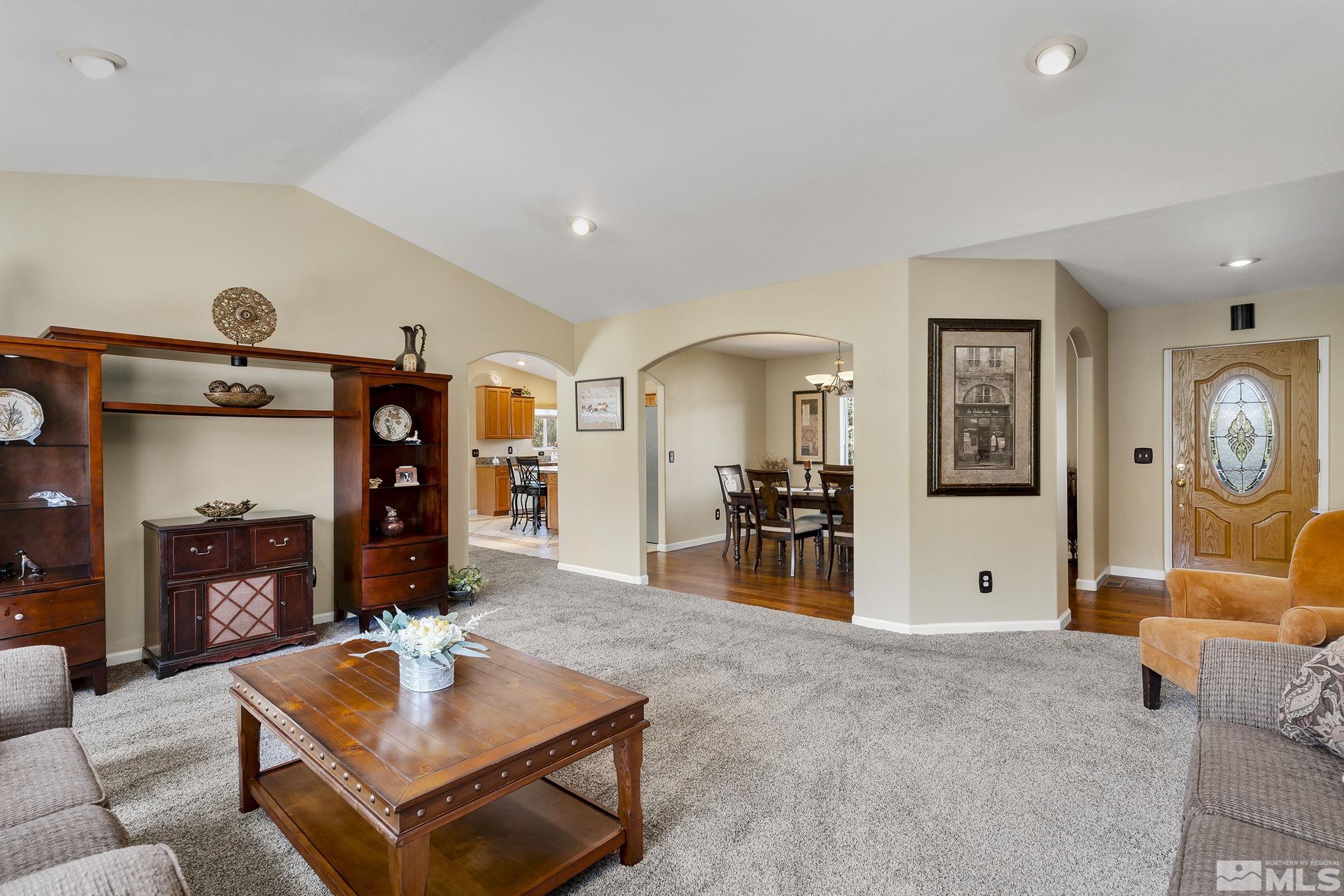 2291 Lousetown Road Reno, NV 89521 - Photo 8 of 40 a living room with furniture and a flat screen tv