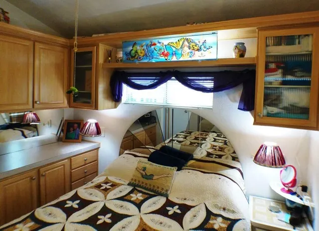 a kitchen with stainless steel appliances a sink and a stove