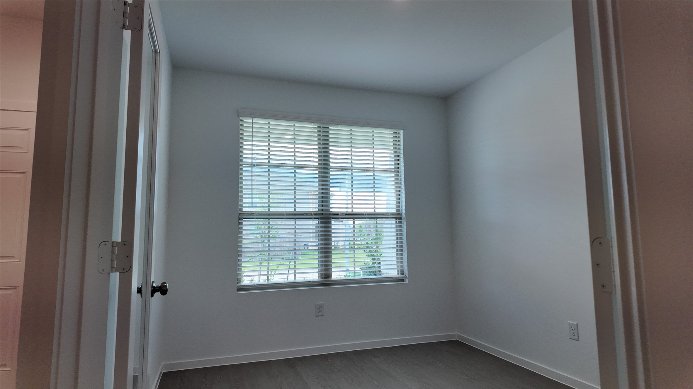 15023 Rustic Moon Road Conroe, TX 77302 - Photo 3 of 18 a view of an empty room with a window