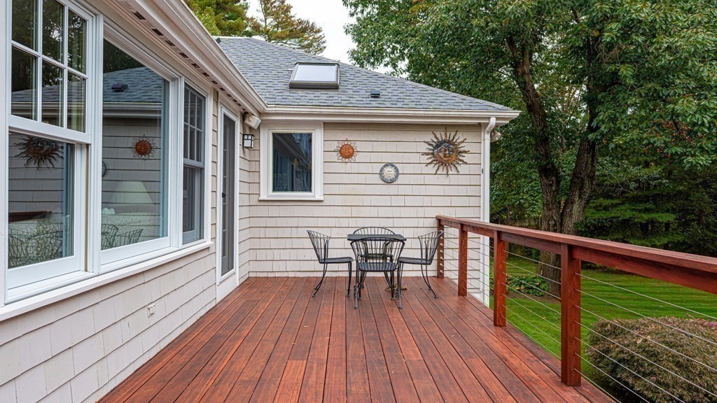 84 Wildwood Drive Needham, MA 02492 - Photo 11 of 36 a view of a two chairs on the roof deck
