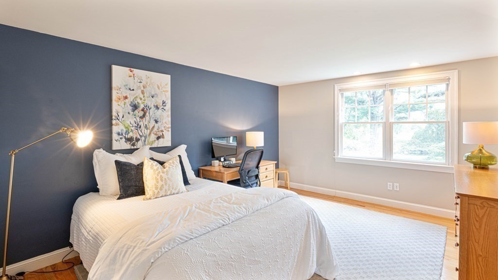 84 Wildwood Drive Needham, MA 02492 - Photo 14 of 36 a bedroom with a bed and a window