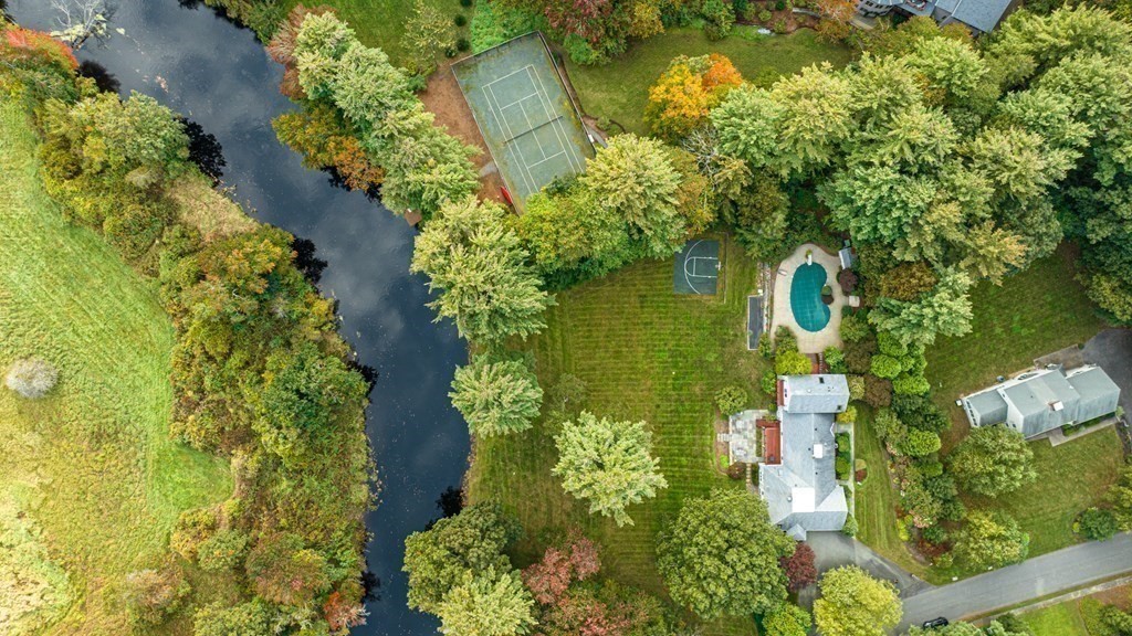 84 Wildwood Drive Needham, MA 02492 - Photo 35 of 36 an aerial view of a house with swimming pool and garden